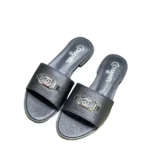 Chanel black leather slides in Dubai UAE