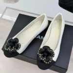 Chanel Ballet Flats – White Leather with Black Cap Toe & Gold Chain Flower Detail in Dubai UAE