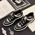 Chanel Quilted Sneakers in Silver, White & Black – Iconic Luxury Footwear in Dubai UAE