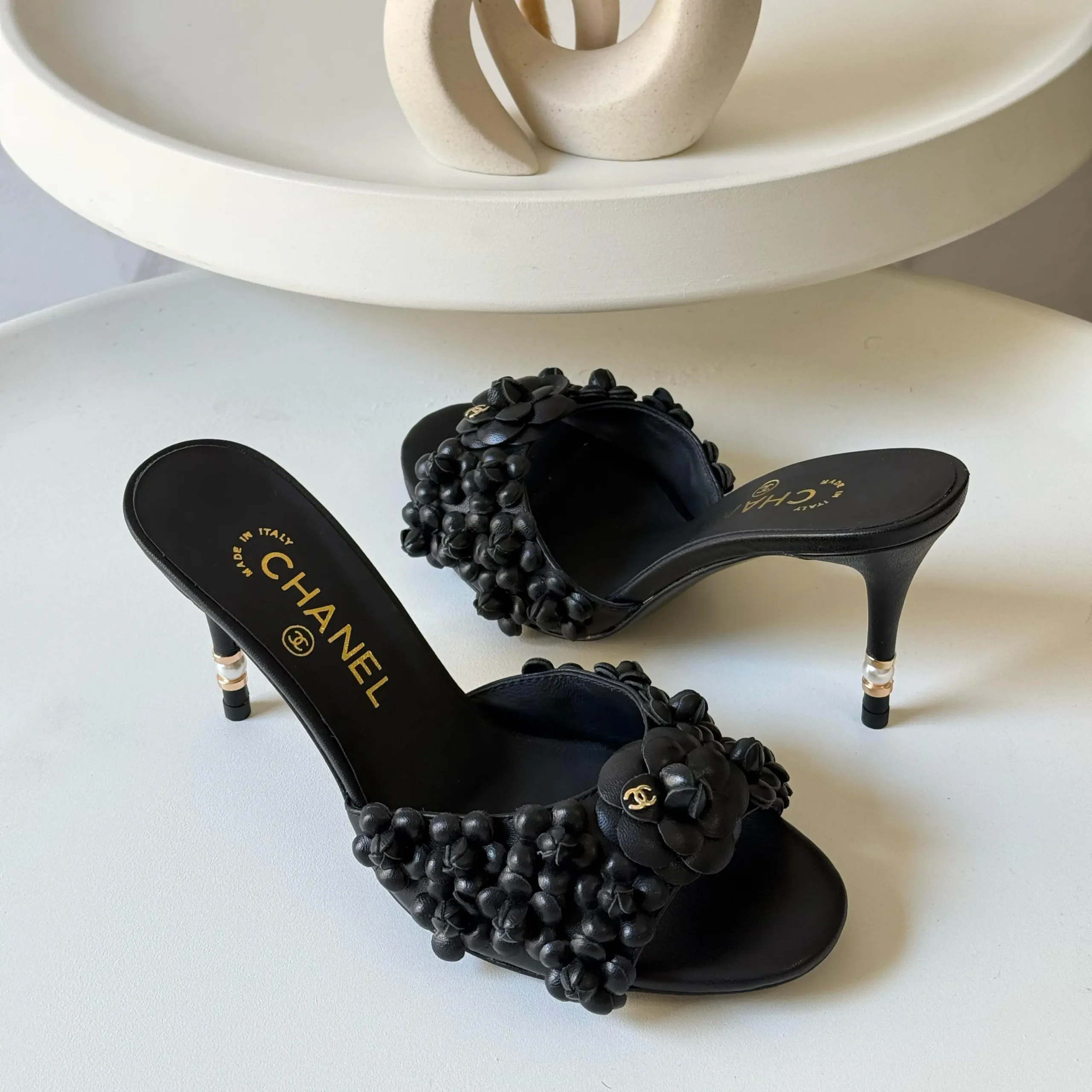 Chanel Women’s Black Leather Camellia Flower Slides – Elegant Floral Designer Footwear in Dubai UAE