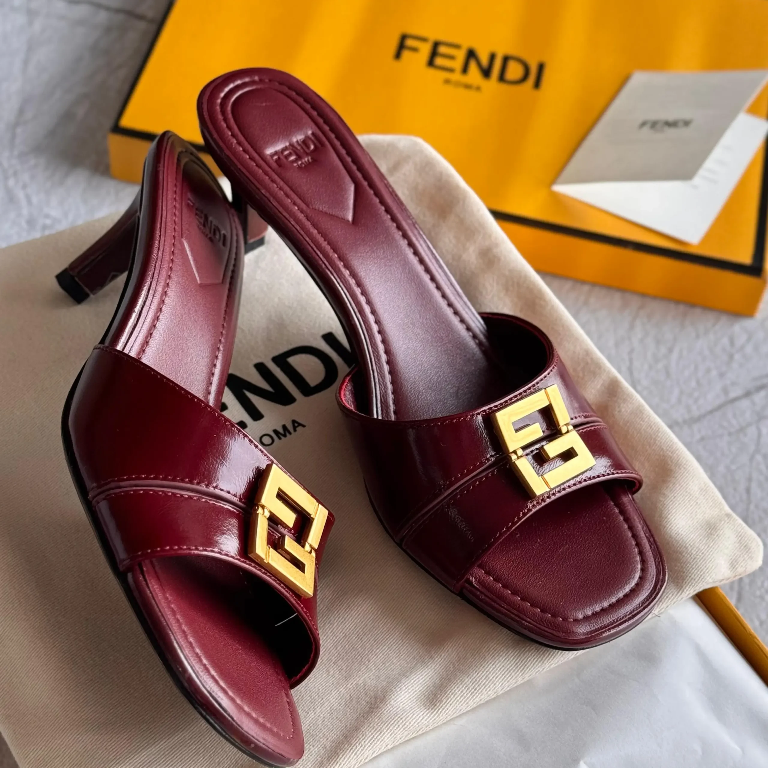 Fendi Fold 55mm Eel Skin Mules – Luxury Heels for Elegant Style in Dubai UAE Fendi Fold 55mm Eel Skin Mules – Luxury Heels for Elegant Style in Dubai UAE