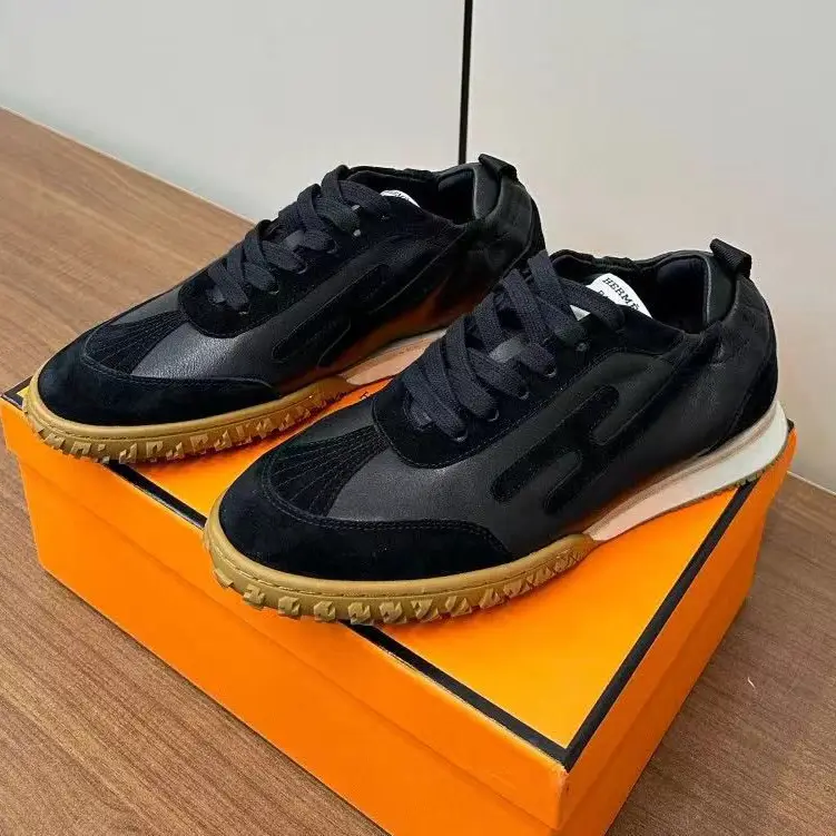 Fendi Women's FF Logo Slides – Brown Leather with Iconic Karl Lagerfeld Design in Dubai UAE (Copy) Hermès Jet Sneakers – Black Suede & Leather with Brown Rubber Sole