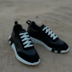 Hermès Bouncing Sneakers – Black Leather & Suede with White Laces and Sole in Dubai UAE