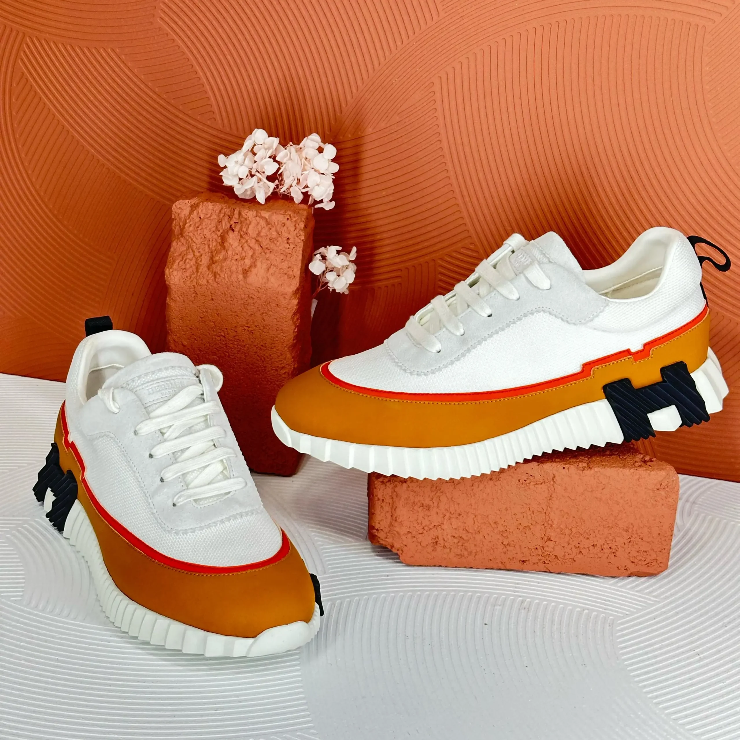 Hermès Bouncing Sneakers – White Upper with Accents & Signature “H” Logo in Dubai UAE