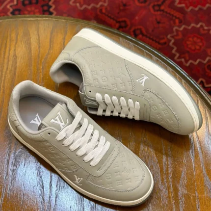 Louis Vuitton Rivoli Sneakers – Monogram-Embossed Leather with White Laces & Sole in Dubai UAE
