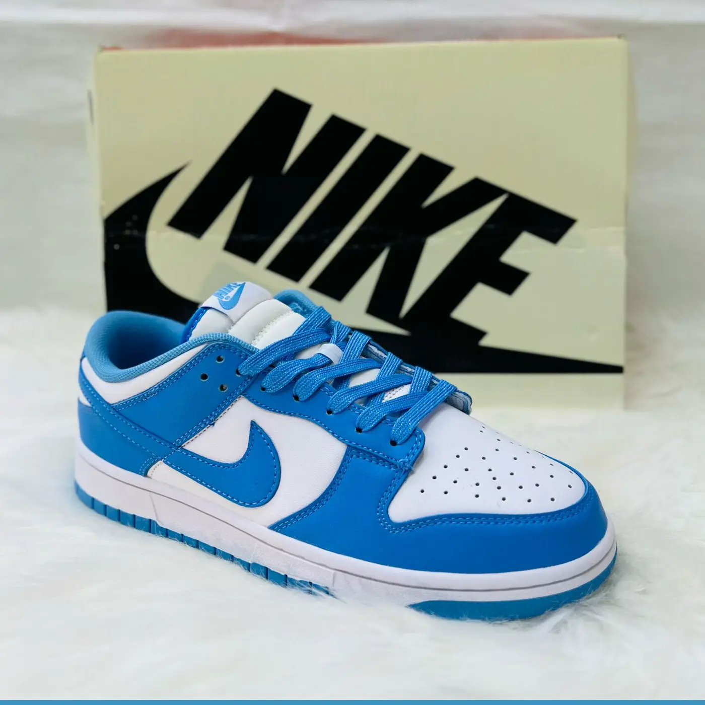 Nike Dunk Low “University Blue” – Iconic Two-Tone Sneaker in White & Light Blue in Dubai UAE Nike Dunk Low “University Blue” – Iconic Two-Tone Sneaker in White & Light Blue in Dubai UAE