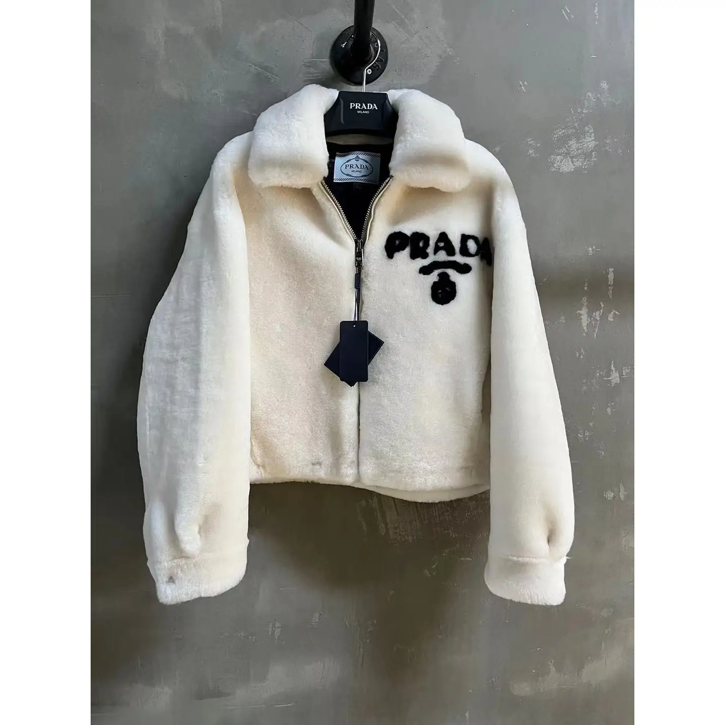 Prada Shearling Jacket – Luxury Cream-Colored Designer Outerwear for Women in Dubai UAE Prada Shearling Jacket – Luxury Cream-Colored Designer Outerwear for Women in Dubai UAE