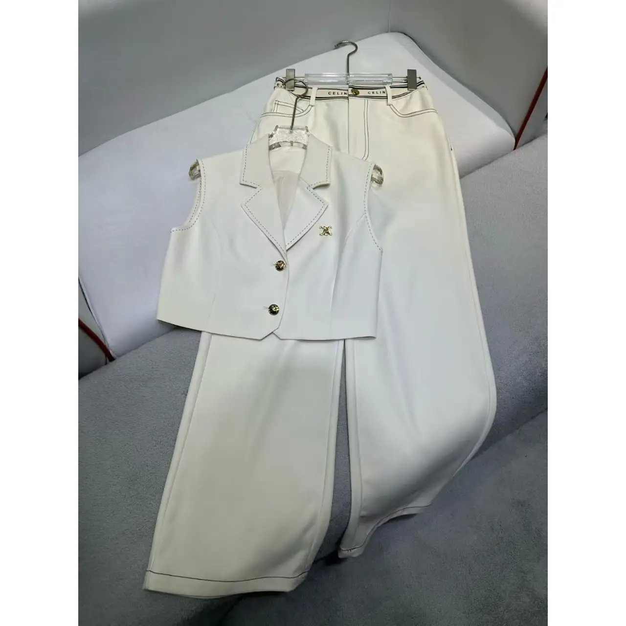 Women's White Sleeveless Two-Piece Set – Turn-Down Collar Vest Crop Top & Wide-Leg Shorts Suit in Dubai UAE Women's White Sleeveless Two-Piece Set – Turn-Down Collar Vest Crop Top & Wide-Leg Shorts Suit in Dubai UAE