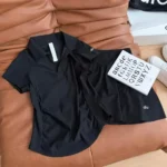 Alo Yoga Black Polo Shirt & Skort Set – Stylish Women's Athleisure Outfit in Dubai UAE