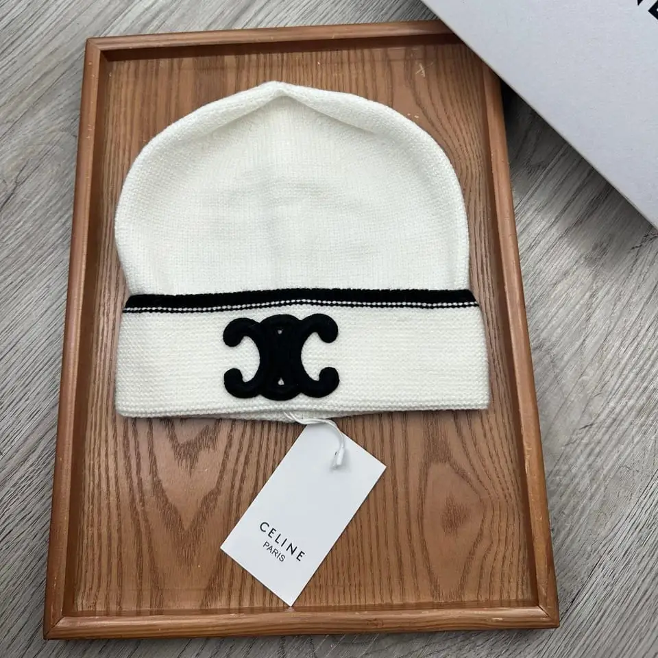Celine White Knitted Beanie Hat with Black Triomphe Logo – Luxury Winter Accessory in Dubai UAE Celine White Knitted Beanie Hat with Black Triomphe Logo – Luxury Winter Accessory in Dubai UAE