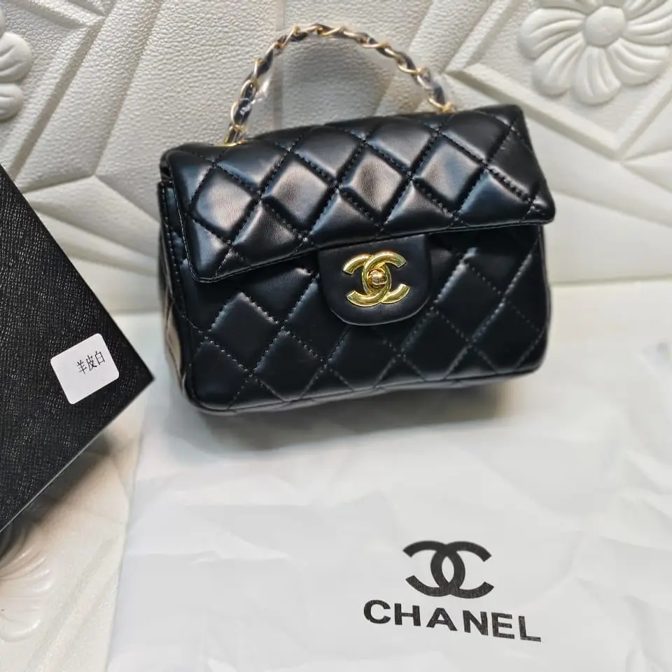 Chanel 23S Top Handle Mini Flap Bag in Black Lambskin with Silver Hardware – 21cm Iconic Classic in Dubai UAE Chanel 23S Top Handle Mini Flap Bag in Black Lambskin with Silver Hardware – 21cm Iconic Classic in Dubai UAE