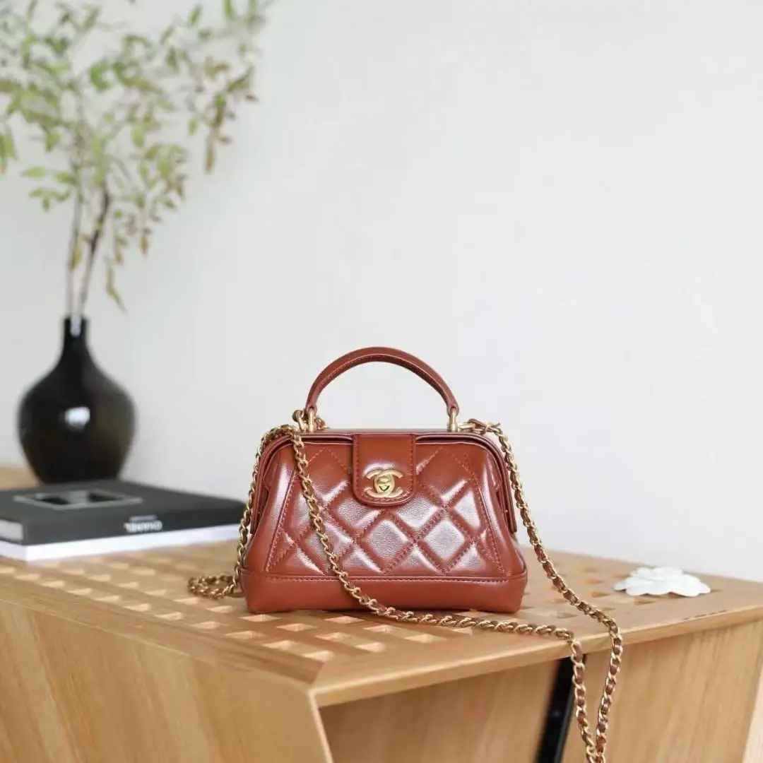 Chanel 24A Métiers d'Art Quilted Handbag – Top Handle & Chain Strap Luxury Bag in Dubai UAE Chanel 24A Métiers d'Art Quilted Handbag – Top Handle & Chain Strap Luxury Bag in Dubai UAE