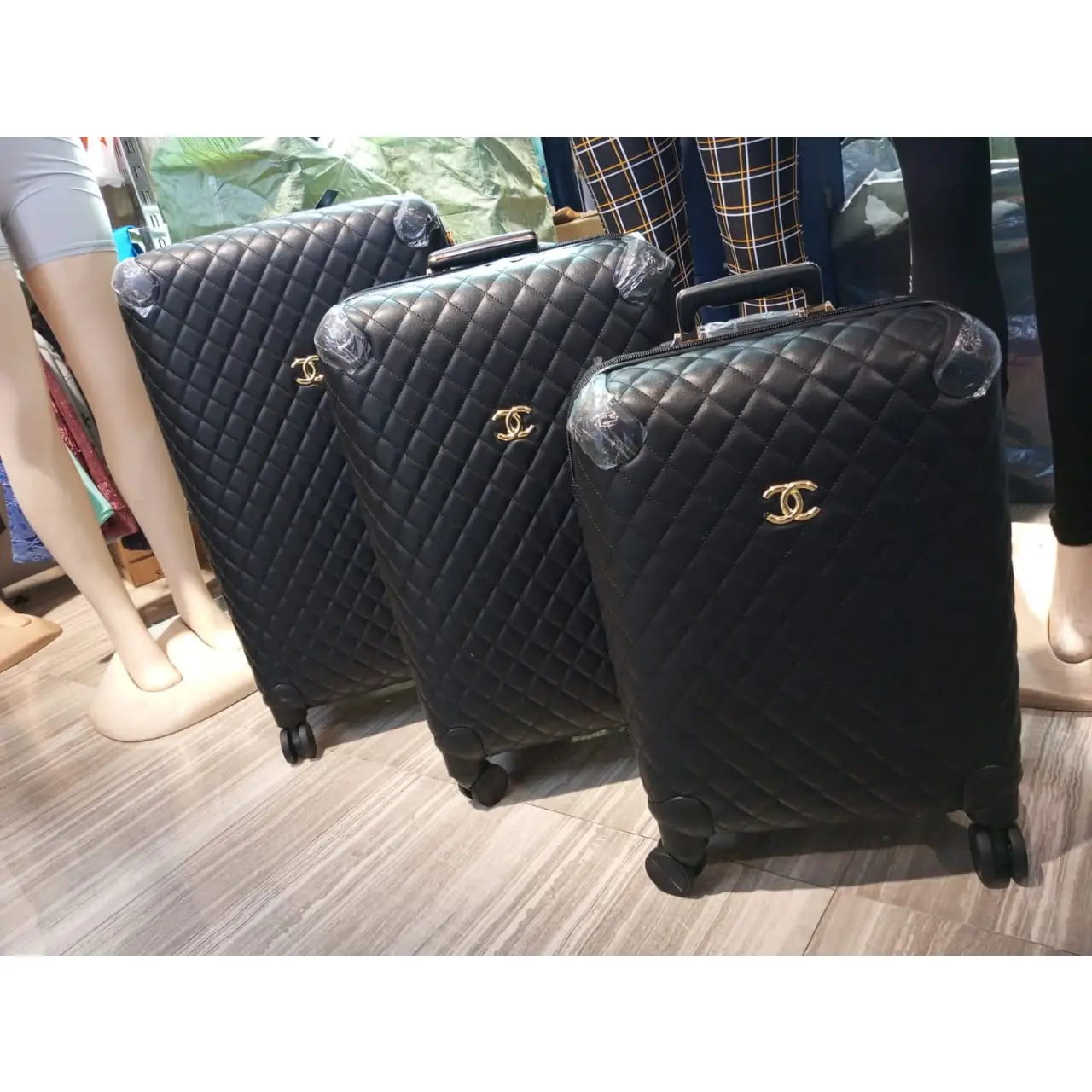 Chanel Luggage – Iconic Quilted Black Suitcases with Signature CC Logo in Dubai UAE Chanel Luggage – Iconic Quilted Black Suitcases with Signature CC Logo in Dubai UAE