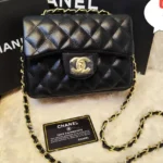 Chanel Mini Flap Bag in Black Quilted Leather – Timeless Luxury Handbag in Dubai UAE