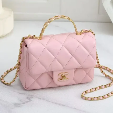 Chanel Mini Flap Bag in Quilted Lambskin with Heart Charms – Iconic Compact Luxury in Dubai UAE