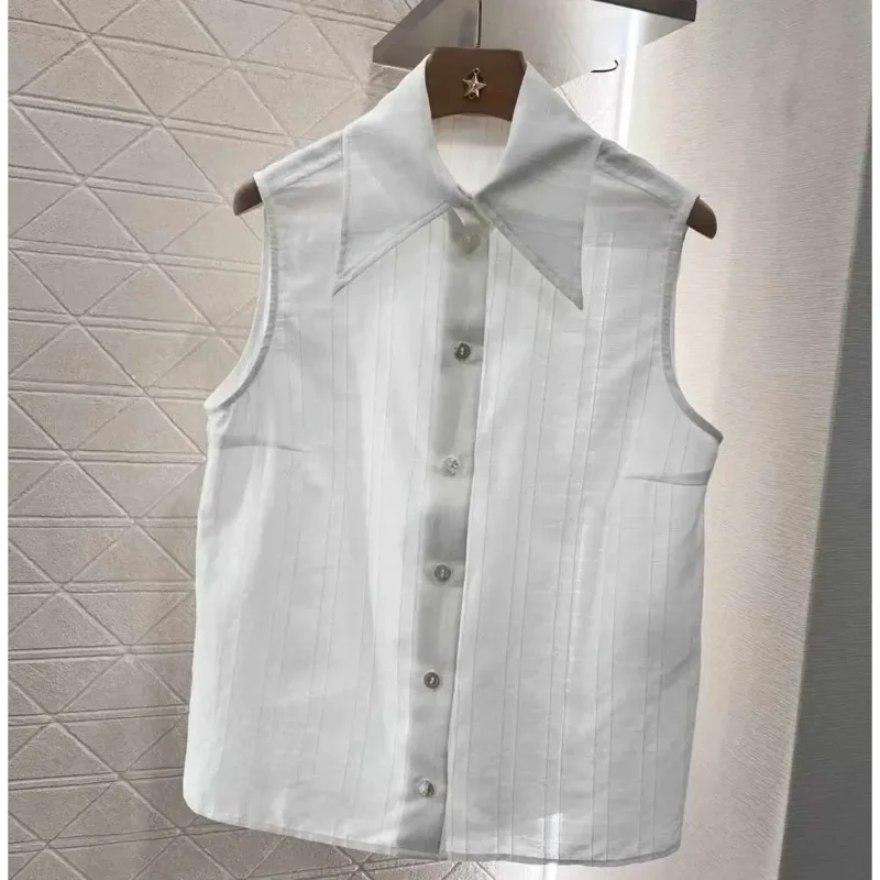 Chanel Sleeveless White Silk Blouse – Elegant Luxury Top for Women in Dubai UAE