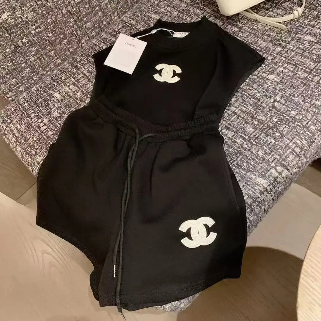 Chanel Two-Piece Lounge Set with Iconic Logo – Designer Top and Shorts in Dubai UAE Chanel Two-Piece Lounge Set with Iconic Logo – Designer Top and Shorts in Dubai UAE