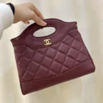 Chic Burgundy Quilted Chanel-Inspired Top-Handle Bag - Elegant & Compact in Dubai UAE