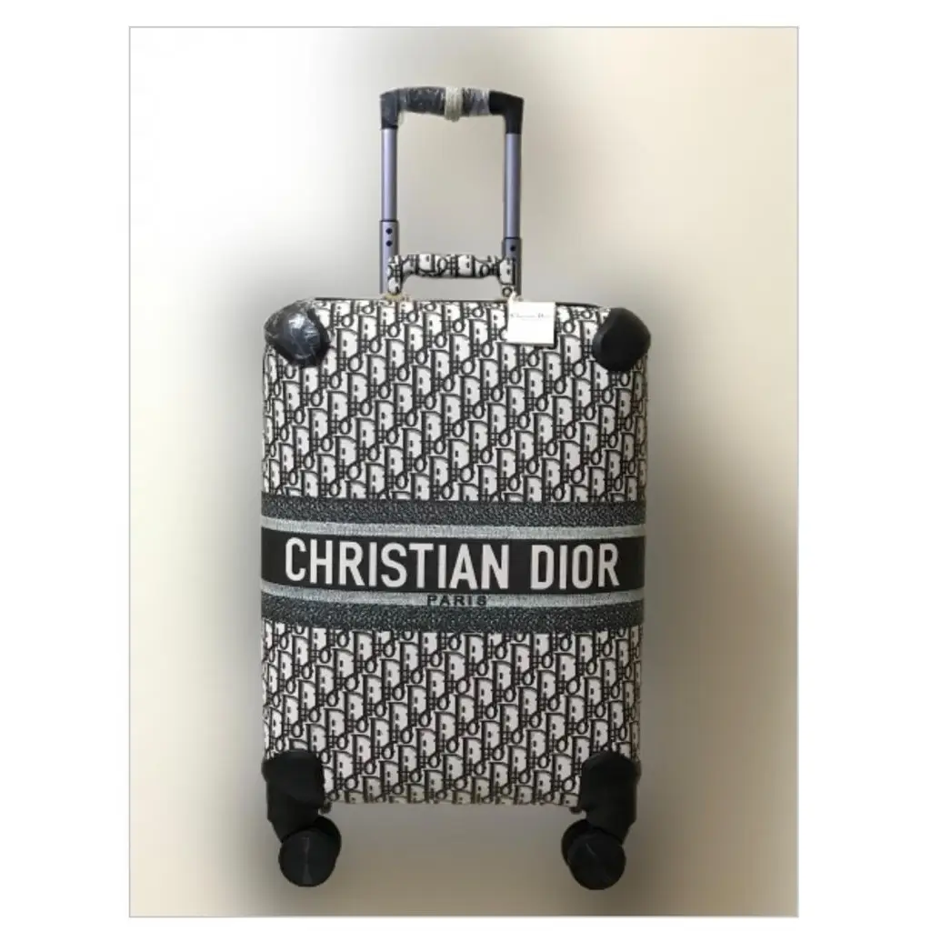 Christian Dior Suitcase – Iconic Parisian Luxury Travel Case with Signature Branding in Dubai UAE Christian Dior Suitcase – Iconic Parisian Luxury Travel Case with Signature Branding in Dubai UAE