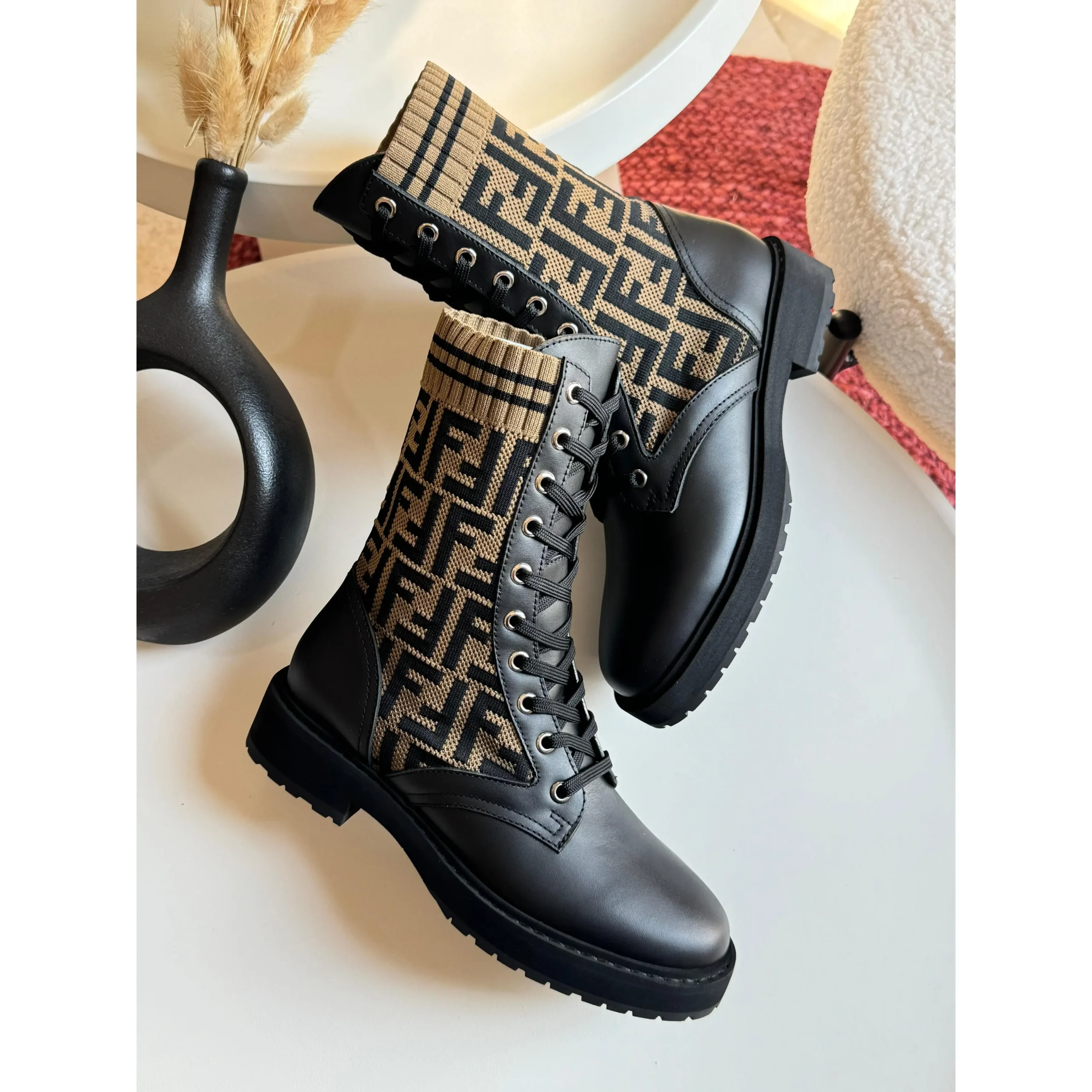 Fendi Rockoko Knit Leather Combat Boots – Black Leather & Logo Knit with Sock-Style Collar in Dubai UAE Fendi Rockoko Knit Leather Combat Boots – Black Leather & Logo Knit with Sock-Style Collar in Dubai UAE