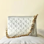 Louis Vuitton Coussin PM Handbag in White Lambskin – Versatile Pillow-Inspired Luxury Bag in Dubai UAE