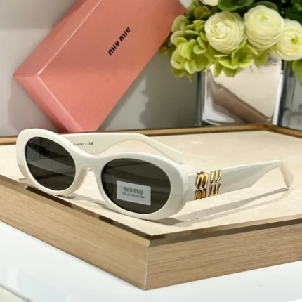 Miu Miu MU 06ZS Sunglasses – White Oval Frame with Logo-Embellished Metal Hinges in Dubai UAE