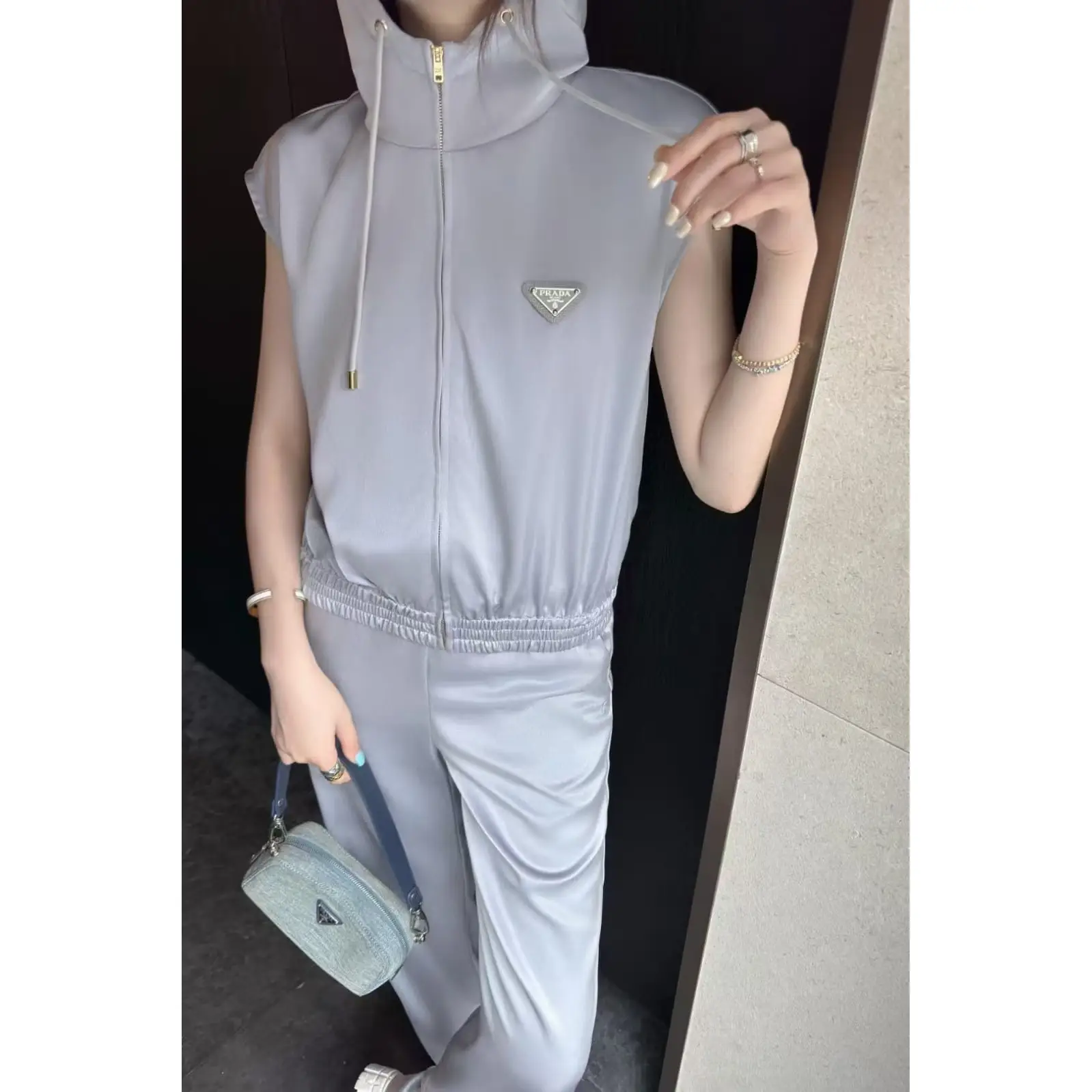 Prada Hooded Sleeveless Tracksuit Set with Iconic Triangle Logo in Dubai UAE Prada Hooded Sleeveless Tracksuit Set with Iconic Triangle Logo in Dubai UAE