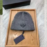 Prada Re-Nylon Wool Blend Beanie Hat with Triangle Logo – Luxury Designer Winter Cap in Dubai UAE